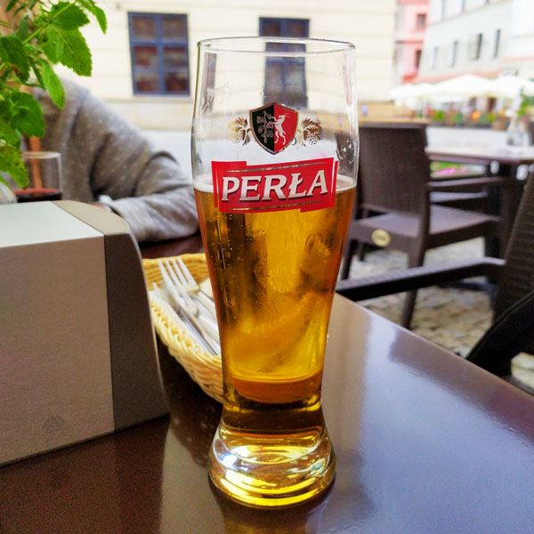 A glass of Perła - Polish beer from Lubelskie region