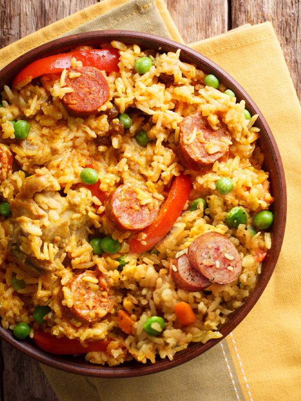 Kielbasa and Rice dish (otherwise known as 'Kielbasa Fried Rice') with peas, mushrooms and bell peppers