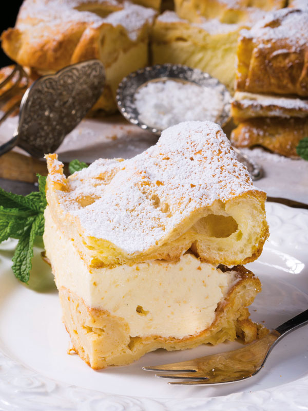 A slice of karpatka - Polish Carpathian Cake with custard cream 