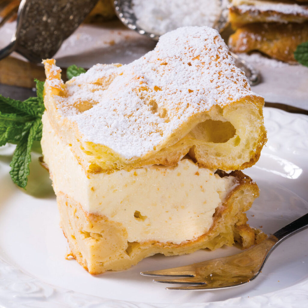 A slice of karpatka - Polish Carpathian Cake with custard cream