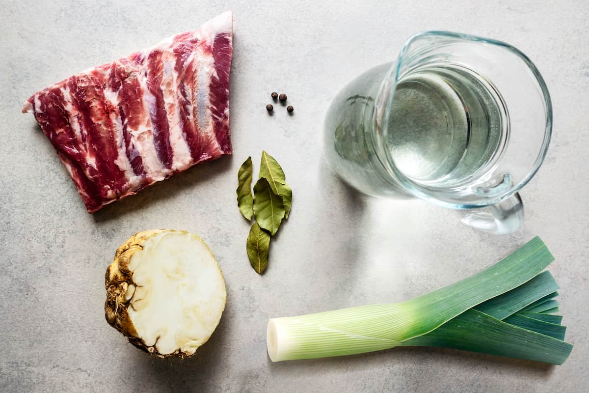 Ingredients for pork rib stock: pork rib, celeriac, leek, bay leaves, all-spice berries and water